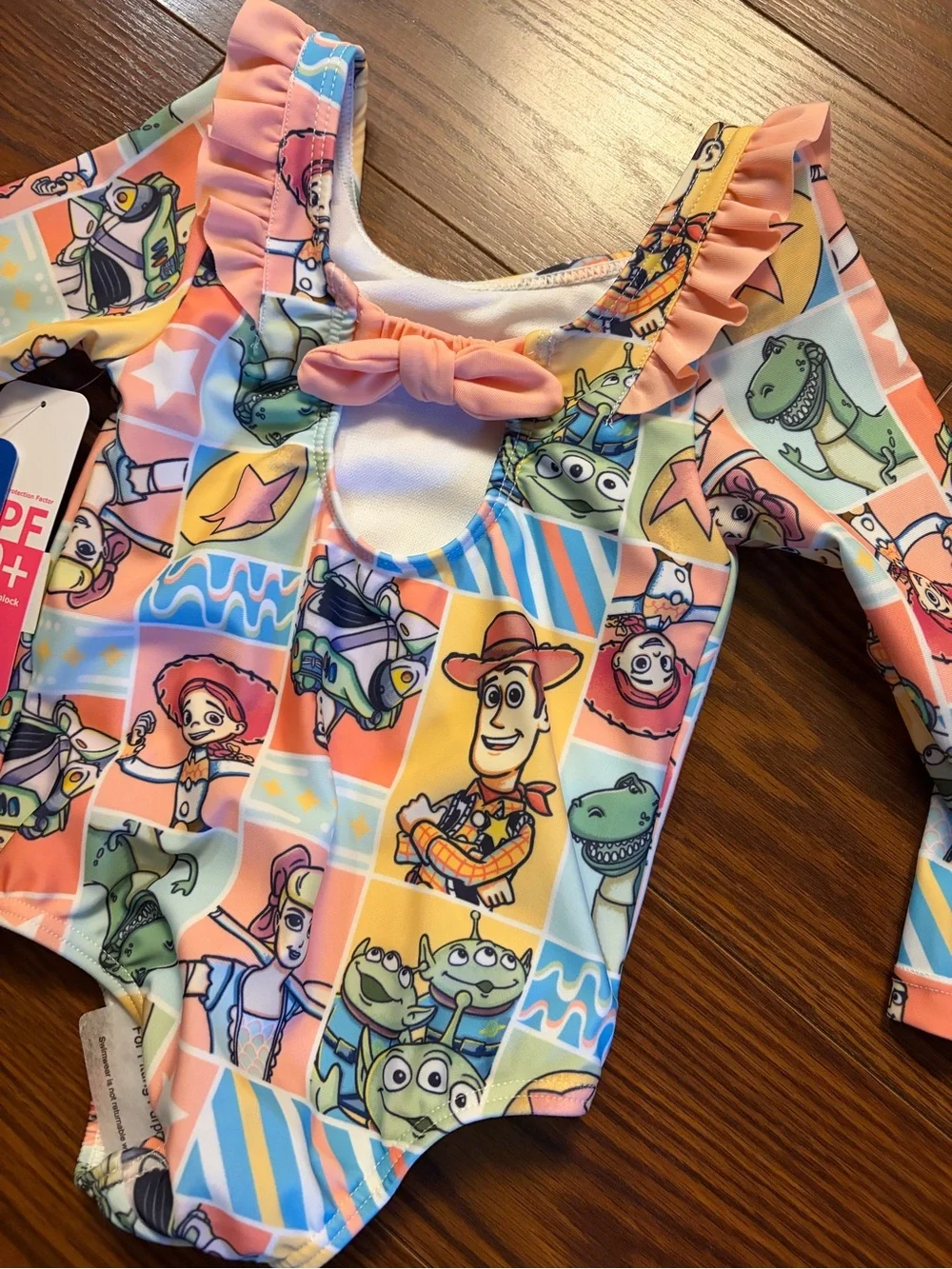 Kids Long-Sleeve One-Piece Swimsuit - Multicolor Toy Print 18mth